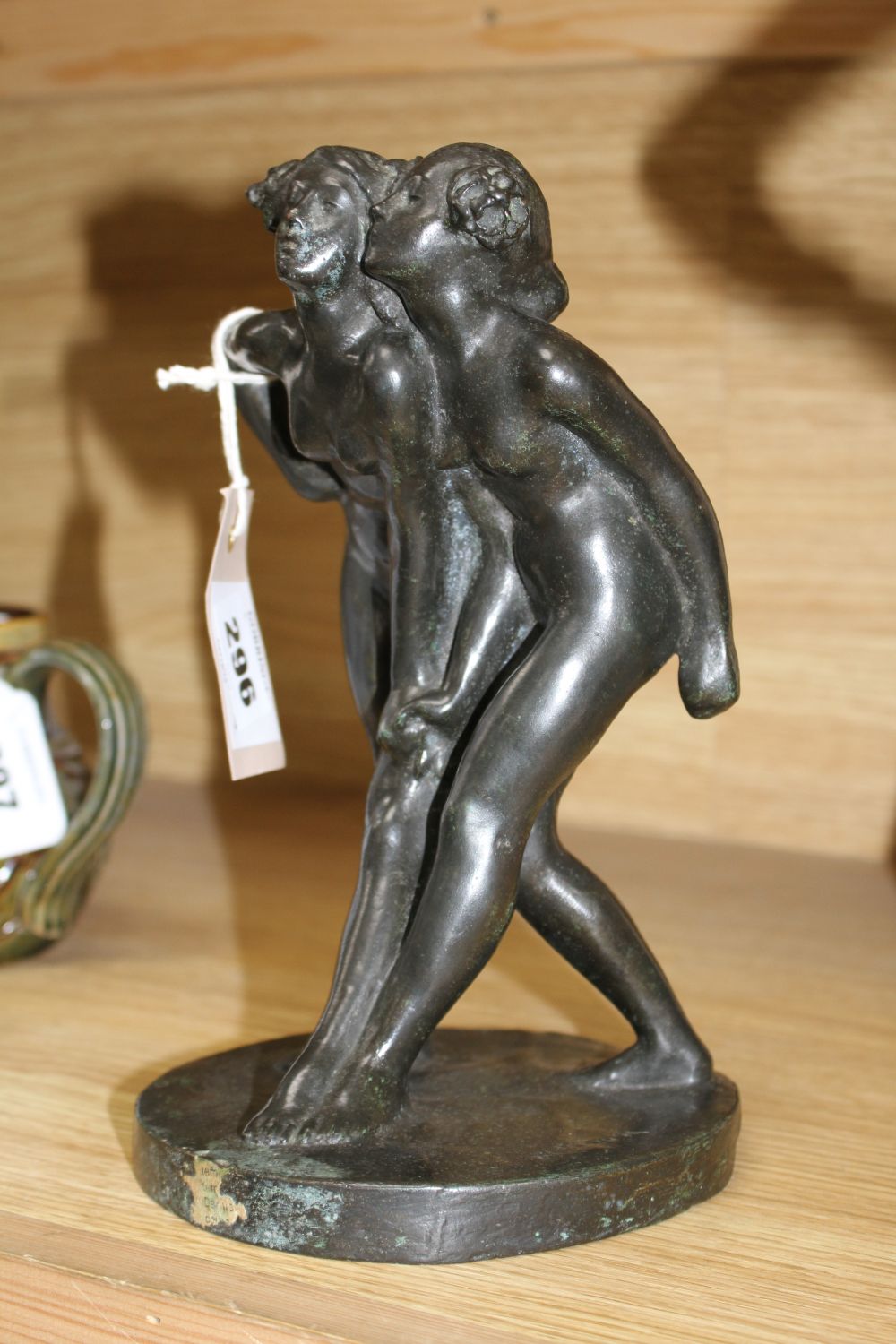 After Pierre-Auguste Renoir. A French lost wax bronze group of embracing maidens, bears signature, height 23cm